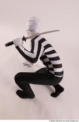 JIRKA KNEELING POSE WITH KATANA